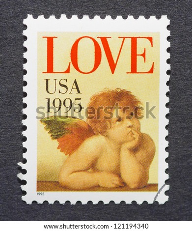 UNITED STATES - CIRCA 1995: a postage stamp printed in United States showing the word Love with a cupid angel, circa 1995.