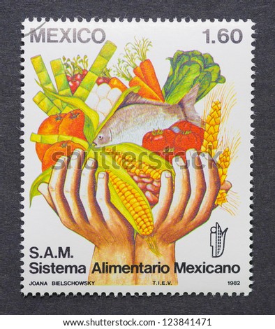 MEXICO - CIRCA 1982: a postage stamp printed in Mexico showing an image of two hands full of food, circa 1982.