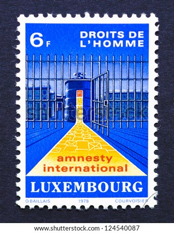 LUXEMBOURG Ã¢Â?Â? CIRCA 1978: a postage stamp printed in Luxembourg commemorative of Amnesty International, circa 1978.