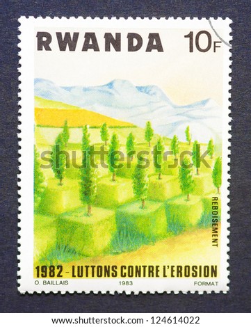 RWANDA  CIRCA 1983  a postage stamp printed in Rwanda with an image of trees planted on combating soil erosion, circa 1983.