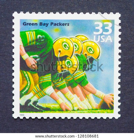 UNITED STATES Ã¢Â?Â? CIRCA 1999: a postage stamp printed in USA celebrating the five National Football League that Green Bay Packers won in the sixties, circa 1999.