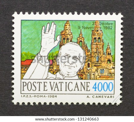 VATICAN CITY - CIRCA 1984: a postage stamp printed in Vatican City to commemorate pope John Paul II travel to Spain, circa 1984.