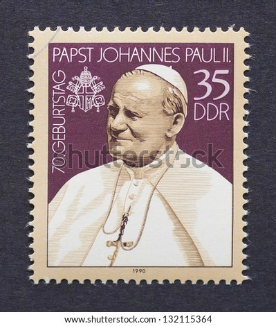 EAST GERMANY - CIRCA 1990: a postage stamp printed in East Germany showing an image of pope John Paul II, circa 1990.