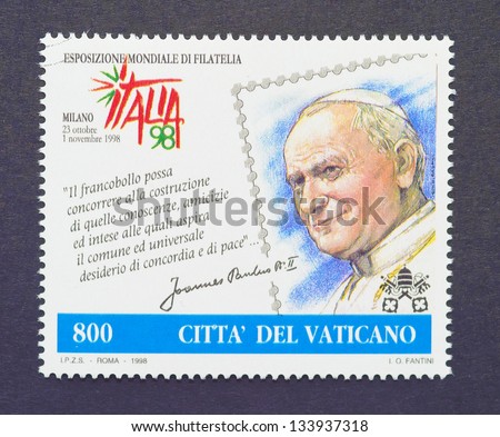 VATICAN CITY - CIRCA 1998: a postage stamp printed in Vatican City showing an image of pope John Paul II, circa 1998.