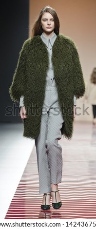 MADRID - FEBRUARY 19: A model walks on the Ailanto catwalk during the Cibeles Madrid Fashion Week runway on February 19, 2013 in Madrid.