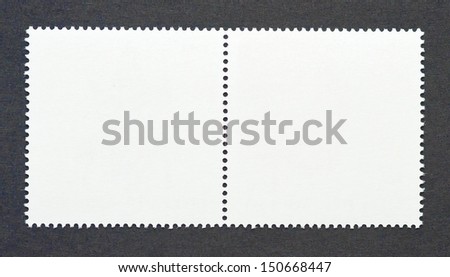 Pair of blank postage stamps isolated on a black background