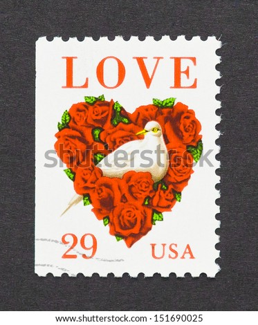 UNITED STATES - CIRCA 1994: a postage stamp printed in United States showing an image of a love heart made of red roses with a dove, circa 1994.