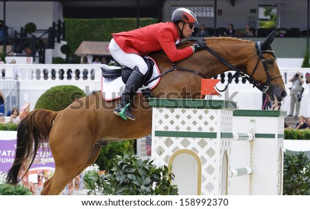 BARCELONA - SEPTEMBER 28: Dieter Kofler rider in action during the Furusiyya Nations Final Cup in Real Club Polo Barcelona, on September 28, 2013, Barcelona, Spain.