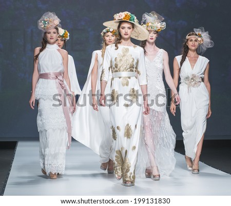 BARCELONA - MAY 08: models walking on the Matile Cano bridal collection 2015 catwalk during the Barcelona Bridal Week runway on May 08, 2014 in Barcelona, Spain.