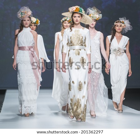 BARCELONA - MAY 08: models walking on the Matile Cano bridal collection 2015 catwalk during the Barcelona Bridal Week runway on May 08, 2014 in Barcelona, Spain.