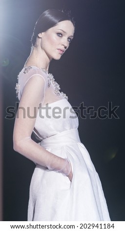 BARCELONA - MAY 09: a model walks on the Juana Martin bridal collection 2015 catwalk during the Barcelona Bridal Week runway on May 09, 2014 in Barcelona, Spain.