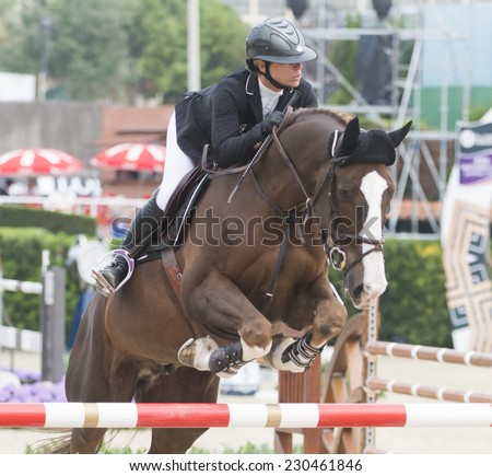 BARCELONA - OCTOBER 10: Marie Hecart rider in action during the CSIO El Periodico Trophy in Real Club Polo Barcelona, on October 10, 2014, Barcelona, Spain.