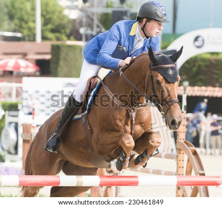 BARCELONA - OCTOBER 10: Christian Ahlmann rider in action during the CSIO El Periodico Trophy in Real Club Polo Barcelona, on October 10, 2014, Barcelona, Spain.