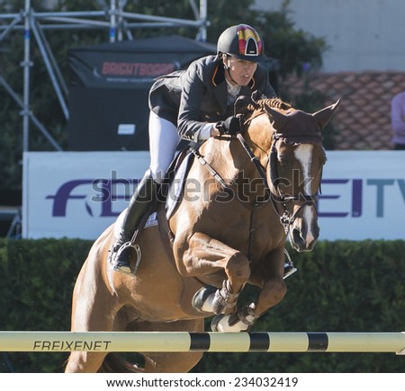 BARCELONA - OCTOBER 09: Pilar Lucrecia Cordon rider in action during the Furusiyya Jumping First Competition in Real Club Polo Barcelona, on October 09, 2014, Barcelona, Spain.