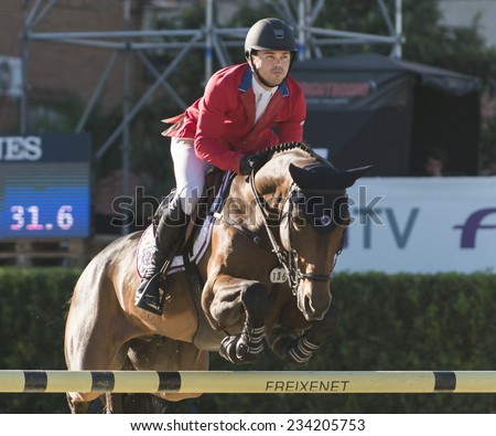BARCELONA - OCTOBER 09: Kent Farrington rider in action during the Furusiyya Jumping First Competition in Real Club Polo Barcelona, on October 09, 2014, Barcelona, Spain.