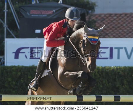 BARCELONA - OCTOBER 09: Andres Rodriguez rider in action during the Furusiyya Jumping First Competition in Real Club Polo Barcelona, on October 09, 2014, Barcelona, Spain.