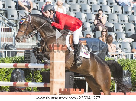 BARCELONA - OCTOBER 09: Andres Rodriguez rider in action during the Furusiyya Jumping First Competition in Real Club Polo Barcelona, on October 09, 2014, Barcelona, Spain.