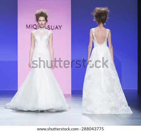 BARCELONA - MAY 06: models walking on the Miquel Suay bridal collection 2016 catwalk during the Barcelona Bridal Week runway on May 06, 2015 in Barcelona, Spain.