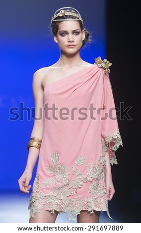 BARCELONA - MAY 07: a model walks on the Matilde Cano bridal collection 2016 catwalk during the Barcelona Bridal Week runway on May 07, 2015 in Barcelona, Spain.