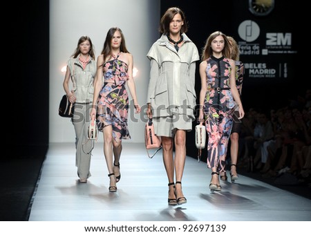 MADRID SEPTEMBER 16 Models walking on the Adolfo Dominguez catwalk during the Cibeles Madrid Fashion Week runway on September 16 2011 in Madrid Spain.. MADRID SEPTEMBER 16 Models walking on the Adolfo Dominguez catwalk during the Cibeles Madrid Fashion Week runway on September 16 2011 in Madrid Spain..
