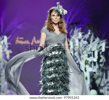 MADRID - FEBRUARY 1: A model walks on the Francis Montesinos catwalk during the Mercedes-Benz Fashion Week Madrid runway on February 01, 2012 in Madrid, Spain.