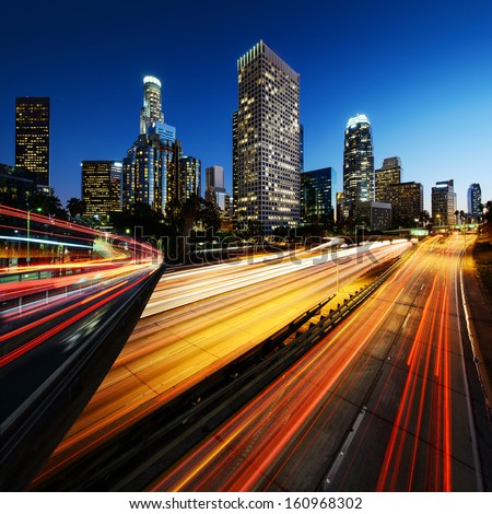 City Of Los Angeles California At Sunset With Light Trails