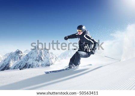 Skier in high mountains - alpine