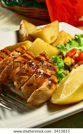 grilled chicken breast with mango salsa and baked potatoes
