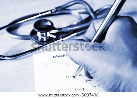 doctor writing a medical prescription