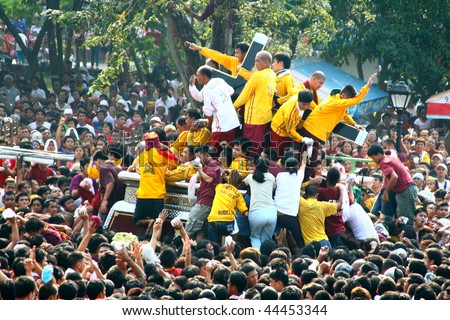 MANILA - JANUARY 9: Feast of The Black Nazarene, the single  biggest religious celebration that draws millions of local devotees to this event January 9, 2010 in Manila,Philippines.