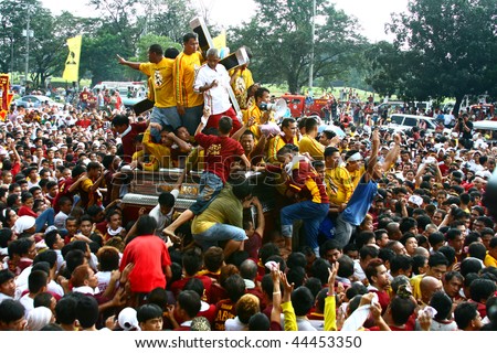 MANILA - JANUARY 9: Feast of The Black Nazarene, the single  biggest religious celebration that draws millions of local devotees to this event January 9, 2010 in Manila,Philippines.