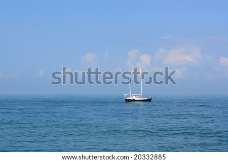 Small yacht in the quiet sea