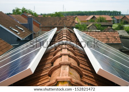 Detail of cable connecting solar panels on the roof