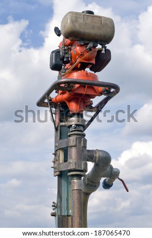 Small old fuel powered machine for drilling water bore or well