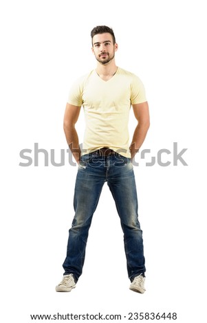 Handsome latin male model smiling. Full body length portrait isolated over white background.