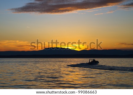 Boat silhouette in the sunset