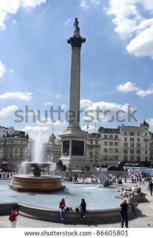 LONDON - MARCH 11: Tourists visit Trafalgar Square on March 11, 2007 in London, UK.  At its centre is Nelson\'s Column that commemorates the Battle of Trafalgar (1805).