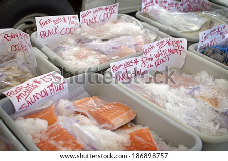 Fresh fish on ice at an open air farmers market.