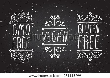 Hand-sketched typographic elements on chalkboard background GMO free Vegan Gluten free Suitable for ads signboards menu and web banner designs Hand-sketched typographic elements on chalkboard background GMO free Vegan Gluten free Suitable for ads signboards menu and web banner designs
