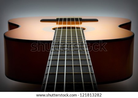 Classical guitar lying flat vignette Classical guitar lying flat vignette