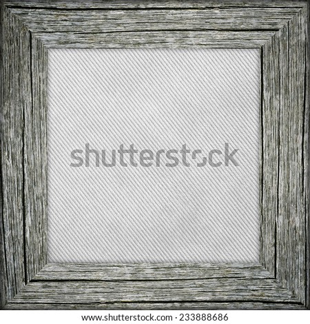 Old raw wooden frame with grey striped canvas
