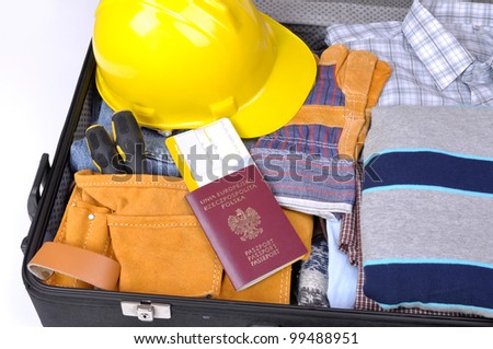 travel for money, job tourism, suitcase with clothes of the Polish worker