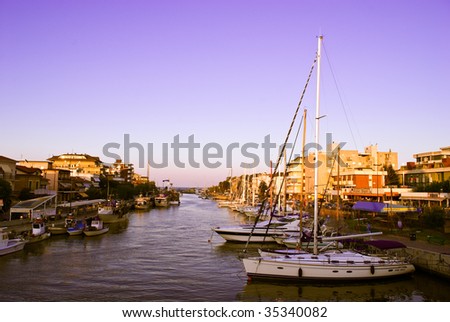 Boats docked near the Adriatic Sea late evening.