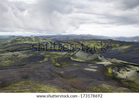 Hills covered with black ash and green moss at Lakagigar national park, Iceland