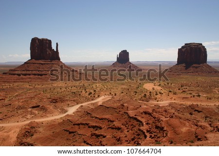 The vast openness of Monument valley in Arizona is made plain by the small stature of the giant rock formations known as the mittens.