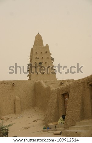 the tower of an ancient mud mosque in Timbuktu, Mali, in AFrica issues the call to prayer each day for the Muslim faithful