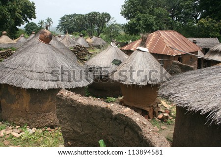 A village of thatched roof huts is typical of Taneka architecture in Benin AFrica