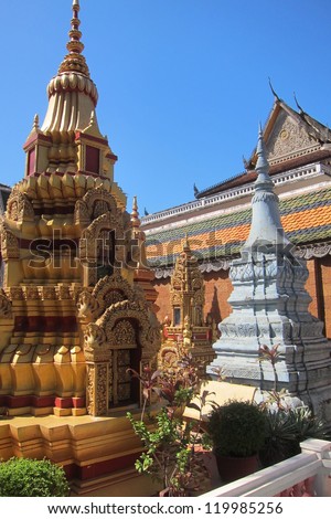 Towering stupas or burial memorials mark the resting place of prominent monks at a Cambodian monastery in Siem Reap, Cambodia