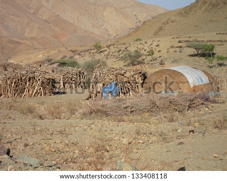 Nomad huts made of  cast off debris are common in the Danakil desert of Ethiopia