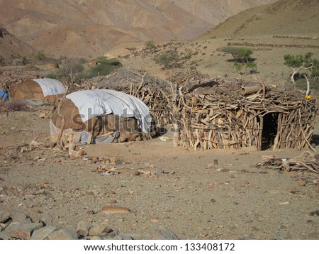 Nomad huts are made from cast off debris in  the desert of Ethiopia